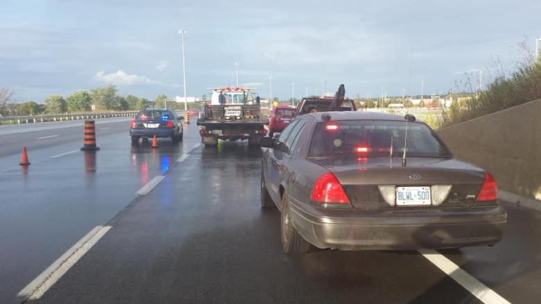 Tow truck driver still in hospital after being struck on Highway 417