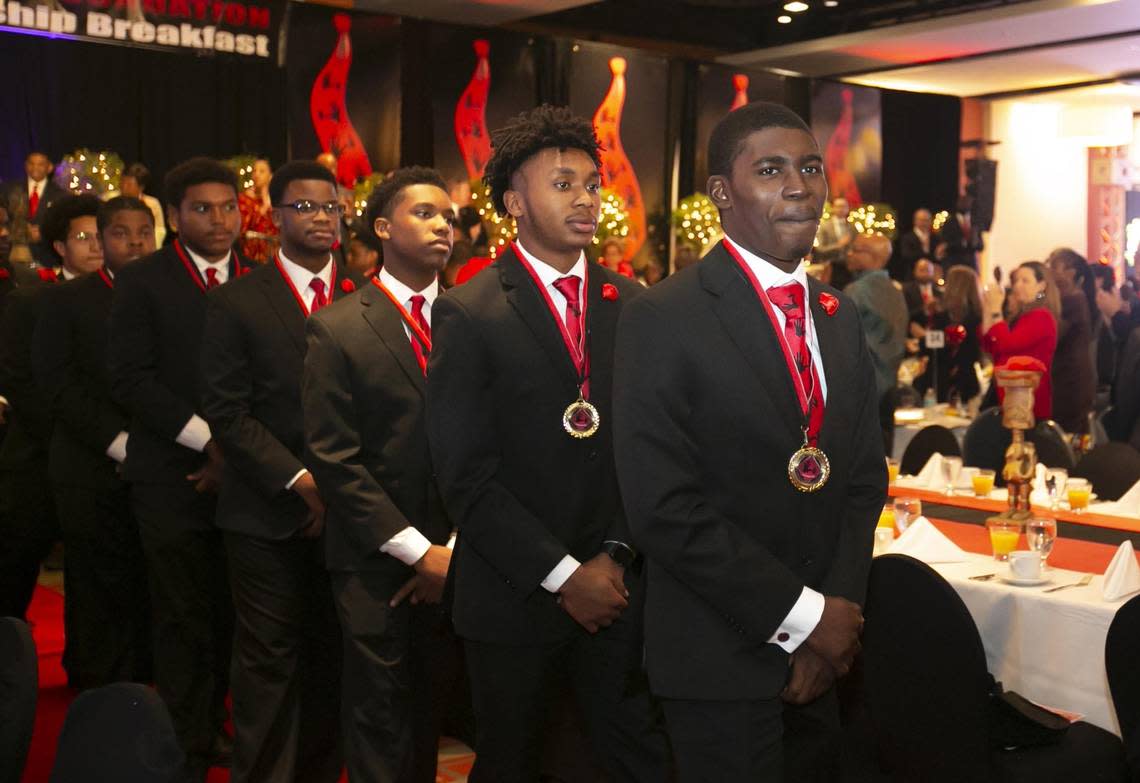 A group of Wilson Scholars after receiving their 5000 Role Models of Excellence medals during the 27th annual 5000 Role Models of Excellence Project’s Dr. Martin Luther King, Jr Scholarship Breakfast in 2020 at the DoubleTree by Hilton Hotel Miami Airport and Convention Center.