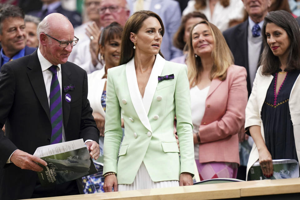 Kate, Princess of Wales, center, arrives in the Royal Box on Centre Court on day two of the Wimbledon tennis championships in London, Tuesday, July 4, 2023. in the royal box, on day two of the Wimbledon tennis championships in London, Tuesday, July 4, 2023. (Adam Davy/PA via AP)