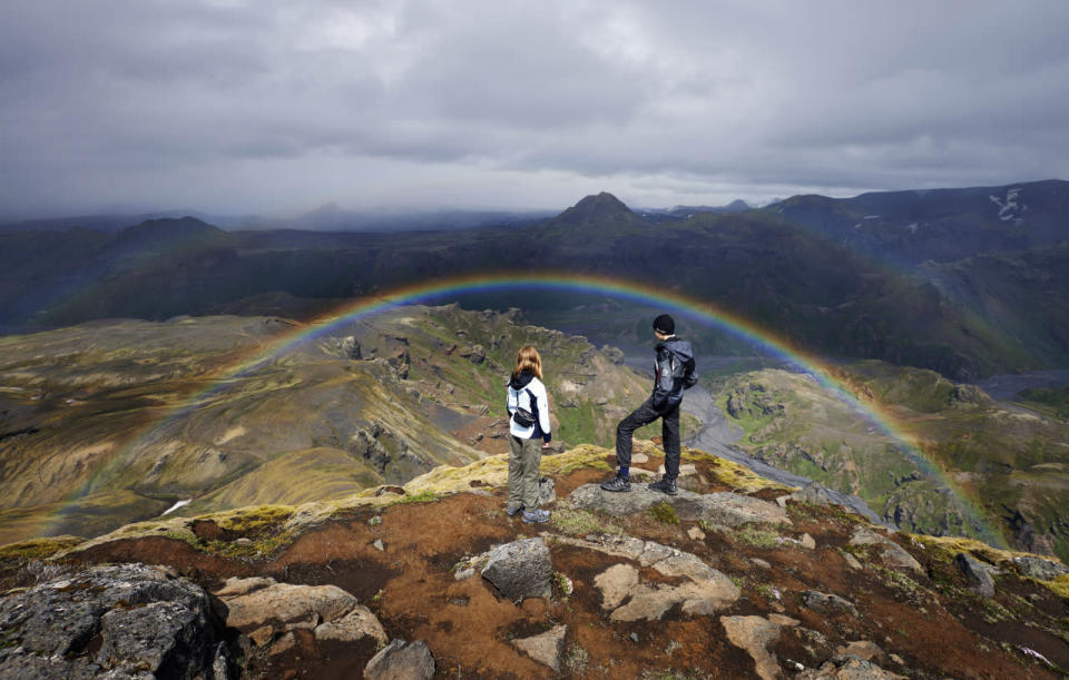 A landscape view of a rainbow appearing on Iceland’s Laugavegur trek. (Michael Fersch/Caters News Agency)