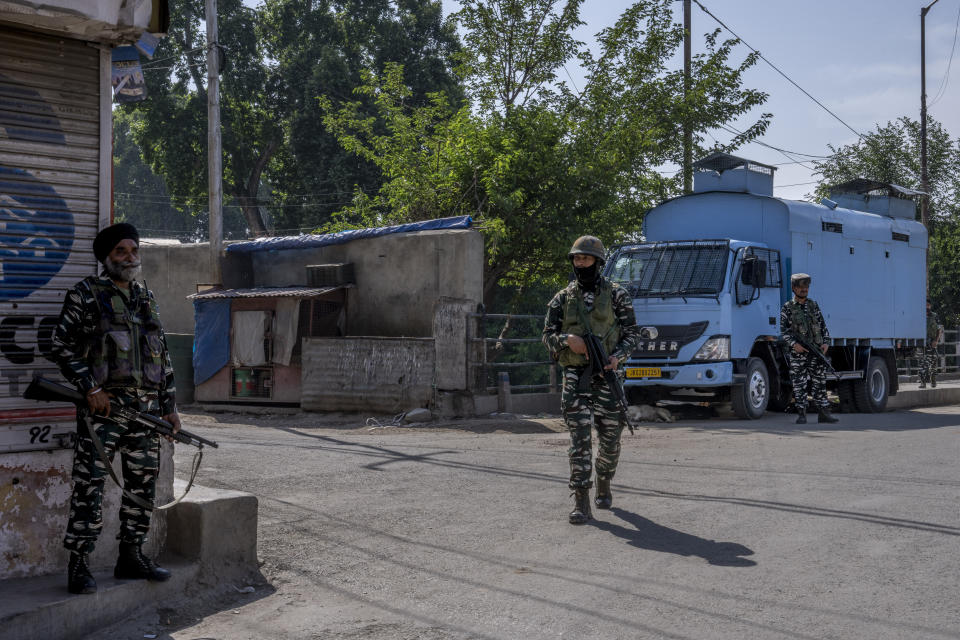 Paramilitary soldiers stand guard outside closed market during a strike against the remarks made by Nupur Sharma, a spokesperson of governing Hindu nationalist party about Prophet Mohammed, in Srinagar, Indian controlled Kashmir, Friday, June 10, 2022. In Indian-controlled Kashmir, authorities locked down two towns on Friday and snapped internet on mobile phones in several towns and in Srinagar, the disputed region’s main city, fearing anger against the insulting remarks to Islam could morph into larger, anti-India protests. (AP Photo/Dar Yasin)