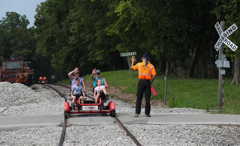 Riders were treated to a 10-mile round-trip scenic view of bourbon distilleries and horse farms aboard Rail Explorers railbikes in Versailles, Ky. on July 27, 2023.  