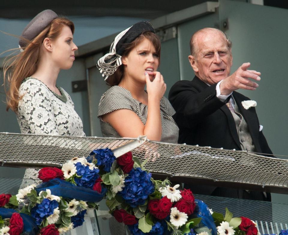 Princesses Beatrice and Eugenie with Prince Philip (PA Archive)