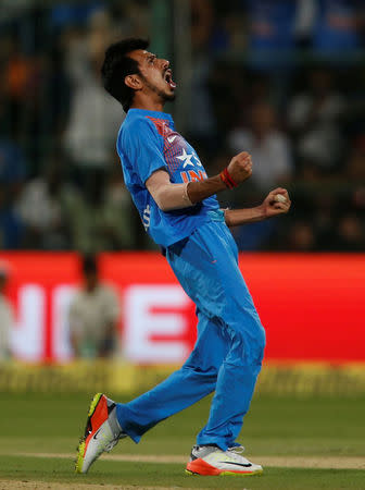 Cricket - India v England - Third T20 International - M Chinnaswamy Stadium, Bengaluru, India - 01/02/17. India's Yuzvendra Chahal celebrates the wicket of England's Joe Root. REUTERS/Danish Siddiqui