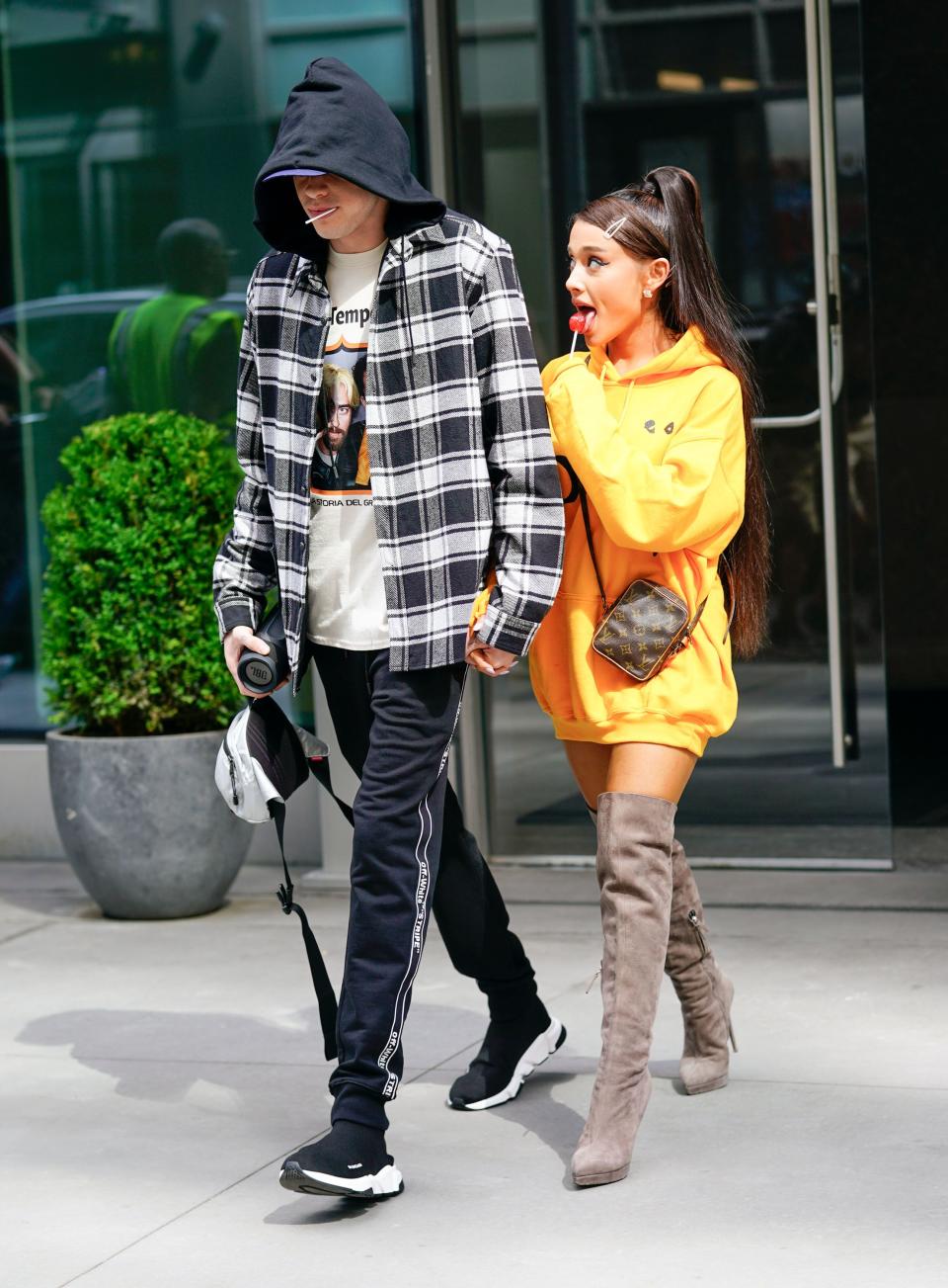 Pete Davidson and Ariana Grande in the street