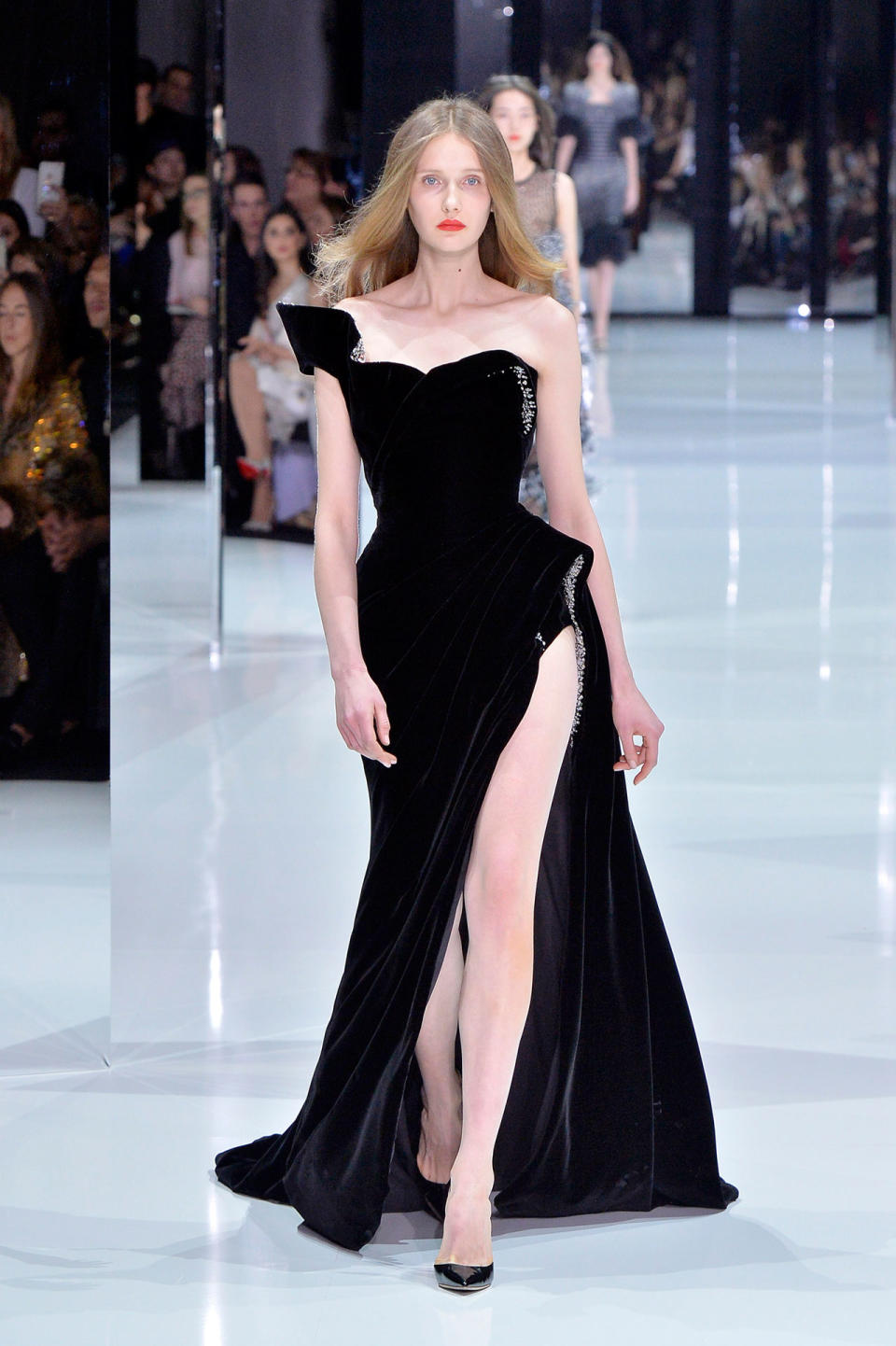 <p>Model wears a svelte one-shoulder black velvet gown with silver embellishments from the Ralph & Russo SS18 Haute Couture show. (Photo: Getty Images) </p>