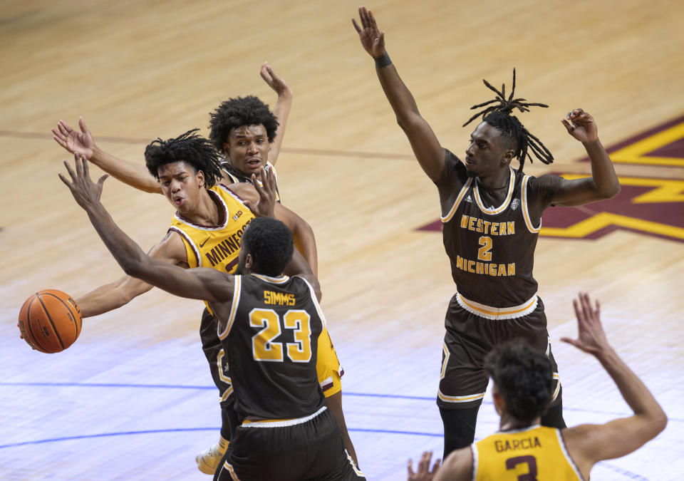 Minnesota's Jaden Henley (24) passes the ball during the second half of the team's NCAA college basketball game against Western Michigan on Monday, Nov. 7, 2022, in Minneapolis. (Carlos Gonzalez/Star Tribune via AP)