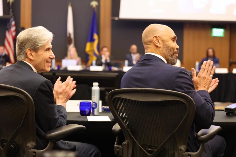 Julio Frenk, left, and Darnell Hunt, right.