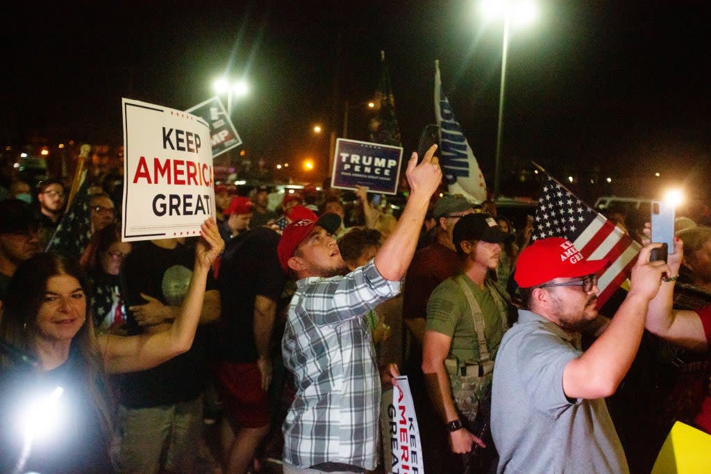 Pro-Trump demonstrators gathered outside the Maricopa County Elections Office building on Wednesday as the Arizona vote count continued rolling in. (Getty Images)