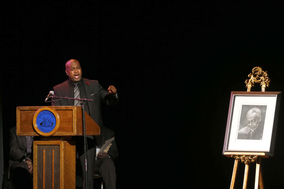 Newark mayoral hopeful Ras Baraka delivers a eulogy for his father, Amiri Baraka, during the poet's funeral Saturday, Jan. 18, 2014, in Newark, N.J. The 79-year-old author of blues-based poems, plays and criticism died Jan. 9 of an undisclosed illness. (AP Photo/Jason DeCrow)