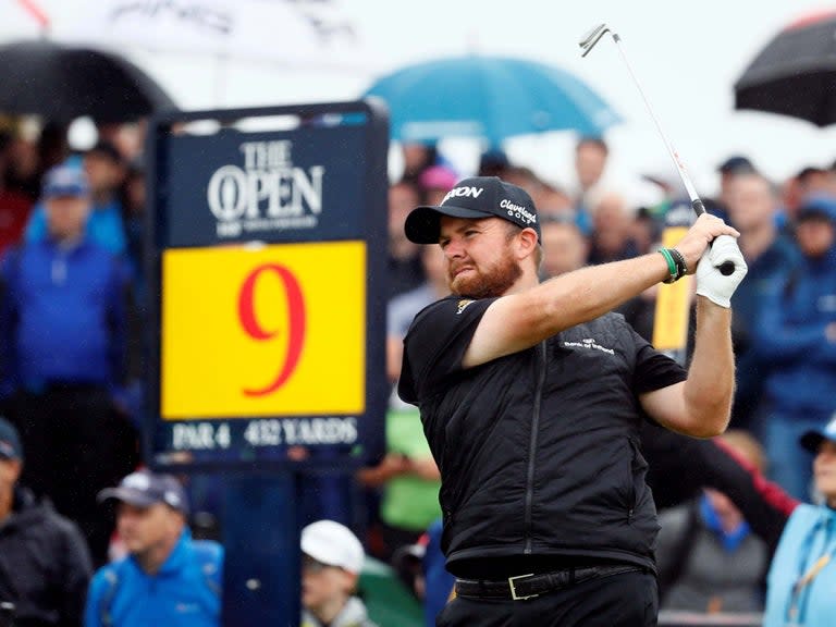 Ireland's Shane Lowry proved master of the Dunluce links for the second successive day to move into a share of the halfway lead with American J.B. Holmes at the British Open on Friday.But there was a bitter-sweet exit for Rory McIlroy, who missed the cut despite bouncing back from his nightmare first round 79 with an excellent 65.​ McIlroy will miss out on the weekend along with Tiger Woods, who shot a one-under 70 but still ended six-over for his two rounds.A flurry of birdies early in a sizzling outward nine of 31 looked like giving the 32-year-old Lowry from across the border the outright lead but a bogey at the 18th left him on eight under after successive rounds of 67. Holmes, the overnight leader, had the better of the weather earlier in the day and consolidated his challenge with a 68. What time does it start?Day two at The Open gets underway at 6:35am, with the final group due to tee off at 4:16pm. Where can I watch it?The Open will be shown live in its entirety on Sky Sports Golf, with highlights on BBC Two from 8pm. PredictionsBrooks Koepka and Jon Rahm have both lived up to their pre-tournament expectations as they sit just two shots off the overnight lead, and both should be able to maintain their challenges through Friday. Tee timesAll times BST (ET + 5 hours), (a) denotes amateur0635 Joaquin Niemann (Chi), Tom Lehman (USA), Miguel Angel Jimenez (Spa)0646 Byeong-Hun An (Kor), Jorge Campillo (Spa), Chris Wood0657 Joel Dahmen (USA), Adri Arnaus (Spa), Dimitrios Papadatos (Aus)0708 Rory Sabbatini (Svk), Stewart Cink (USA), Inn-choon Hwang (Kor)0719 Erik Van Rooyen (Rsa), Kurt Kitayama (USA), Jake McLeod (Aus)0730 Shaun Norris (Rsa), Ryan Fox (Nzl), Dong-kyu Jang (Kor)0741 Keith Mitchell (USA), Tyrrell Hatton, Thomas Pieters (Bel)0752 Justin Thomas (USA), Tommy Fleetwood, Thorbjorn Olesen (Den)0803 Louis Oosthuizen (Rsa), Brooks Koepka (USA), Shubhankar Sharma (Ind)0814 Billy Horschel (USA), Jazz Janewattananond (Tha), Aaron Wise (USA)0825 Jordan Spieth (USA), Marc Leishman (Aus), Danny Willett0836 Cameron Smith (Aus), Adam Hadwin (Can), David Lipsky (USA)0847 Paul Lawrie, Chez Reavie (USA), Justin Harding (Rsa)0903 Tom Lewis, Takumi Kanaya (a) (Jpn), Brandon Stone (Rsa)0914 Lucas Glover (USA), Joost Luiten (Ned), Nino Bertasio (Ita)0925 Ernie Els (Rsa), J.B. Holmes (USA), Abraham Ancer (Mex)0936 Lee Westwood, Brandt Snedeker (USA), Brian Harman (USA)0947 Justin Rose, Tony Finau (USA), Lucas Bjerregaard (Den)0958 Jason Day (Aus), Dustin Johnson (USA), Keegan Bradley (USA)1009 Matt Wallace, Tiger Woods (USA), Patrick Reed (USA)1020 Jon Rahm (Spa), Patrick Cantlay (USA), Matt Kuchar (USA)1031 Doc Redman (USA), Kevin Streelman (USA), Robert Rock1042 Adrian Otaegui (Spa), Yuta Ikeda (Jpn), Isidro Benitez (Mex)1053 Patton Kizzire (USA), Sang Hyun Park (Kor), Yuki Inamori (Jpn)1104 Yoshinori Fujimoto (Jpn), Doyeob Mun (Kor), Andrew Wilson1115 Yosuke Asaji (Jpn), Gunn Charoenkul (Tha), Ashton Turner1136 (a) James Sugrue, Darren Clarke, Charley Hoffman (USA)1147 Emiliano Grillo (Arg), Sung Kang (Kor), (a) Thomas Thurloway1158 Andy Sullivan, Christiaan Bezuidenhout (Rsa), Alexander Levy (Fra)1209 Zander Lombard (Rsa), Chan Kim (USA), Brandon Wu (a) (USA)1220 Richard Sterne (Rsa), Romain Langasque (Fra), (a) Matthias Schmid (Ger)1231 Matthew Fitzpatrick, Padraig Harrington, Andrew Putnam (USA)1242 Eddie Pepperell, Bubba Watson (USA), Rafael Cabrera-Bello (Spa)1253 Phil Mickelson (USA), Shane Lowry, Branden Grace (Rsa)1304 Mike Lorenzo-Vera (Fra), Alex Noren (Swe), Sam Locke1315 Webb Simpson (USA), Sergio Garcia (Spa), Cheng-Tsung Pan (Tai)1326 Ryan Palmer (USA), Andrea Pavan (Ita), Dylan Frittelli (Rsa)1337 Kyle Stanley (USA), Robert Macintyre, Andrew Johnston1348 Oliver Wilson, Mikko Korhonen (Fin), (a) Curtis Knipes1404 Sungjae Im (Kor), Ian Poulter, Kiradech Aphibarnrat (Tha)1415 Henrik Stenson (Swe), Xander Schauffele (USA), Graeme McDowell1426 Russell Knox, Haotong Li (Chn), Bernd Wiesberger (Aut)1437 Jason Kokrak (USA), Connor Syme, Austin Connelly (Can)1448 Zach Johnson (USA), David Duval (USA), Corey Conners (Can)1459 Francesco Molinari (Ita), Bryson DeChambeau (USA), Adam Scott (Aus)1510 Rory McIlroy, Gary Woodland (USA), Paul Casey1521 Kevin Kisner (USA), Rickie Fowler (USA), Hideki Matsuyama (Jpn)1532 Jim Furyk (USA), Si Woo Kim (Kor), Jimmy Walker (USA)1543 Alexander Bjork (Swe), Luke List (USA), Paul Waring1554 Shugo Imahira (Jpn), Nate Lashley (USA), Benjamin Hebert (Fra)1605 Mikumu Horikawa (Jpn), Callum Shinkwin, Garrick Porteous1616 Prom Meesawat (Tha), Matthew Baldwin, Jack Senior