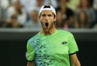 Portugal's Joao Sousa reacts during his third round match against Britain's Andy Murray at the Australian Open tennis tournament at Melbourne Park, Australia, January 23, 2016. REUTERS/Thomas Peter