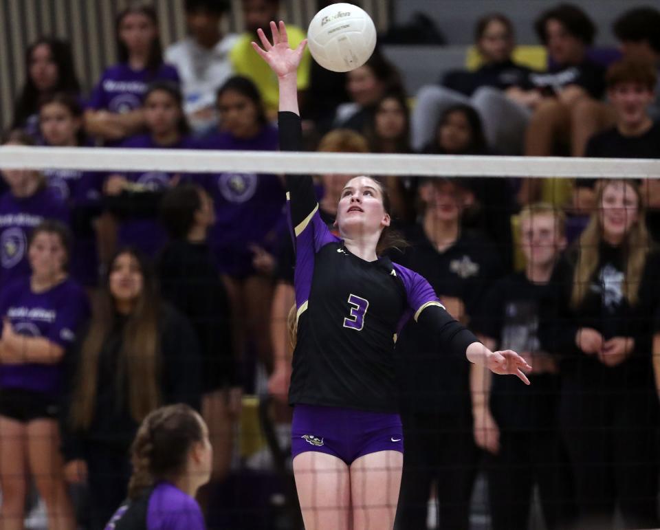 North Kitsap's Sophia Baugh (3) goes up for a spike against  Bainbridge in Poulsbo on Tuesday, Sept. 13, 2022.