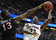 Arizona forward Rondae Hollis-Jefferson (23) shoots over San Diego State forward Winston Shepard (13) during the first half in a regional semifinal of the NCAA men's college basketball tournament, Thursday, March 27, 2014, in Anaheim, Calif. (AP Photo/Mark J. Terrill)