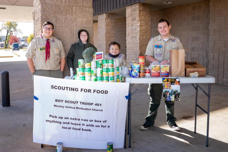 Boy Scout Troop 461 collected food for the Scouting for Food fundraiser.