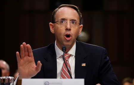 FILE PHOTO: Deputy U.S. Attorney General Rod Rosenstein testifies at a Senate Intelligence Committee hearing on the Foreign Intelligence Surveillance Act (FISA) in Washington, U.S., June 7, 2017. REUTERS/Kevin Lamarque/File Photo