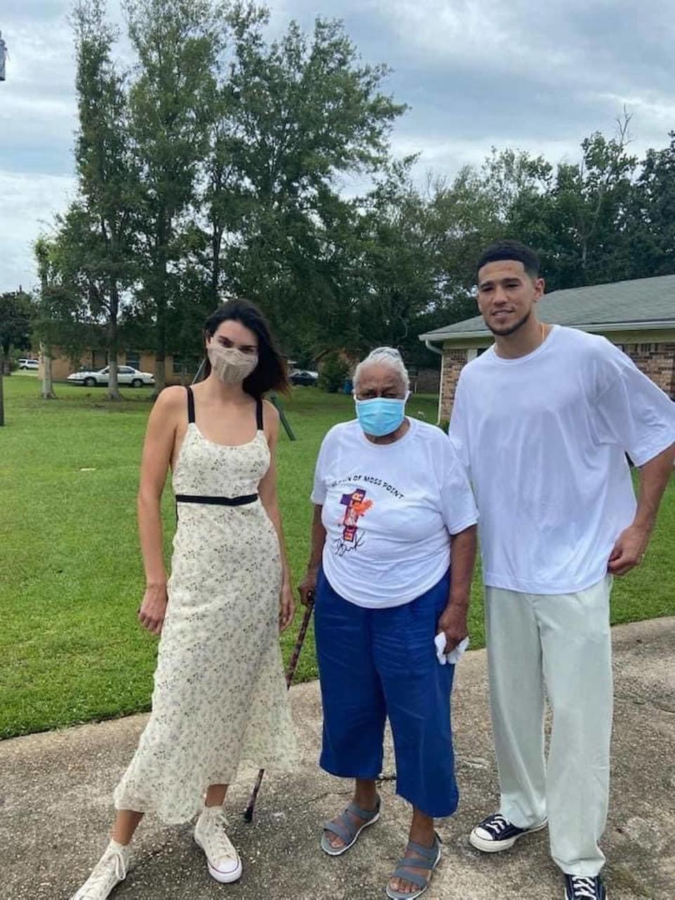 Kendall Jenner joins Devin Booker at a basketball court opening Moss Point on Aug. 28