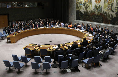 U.S. President Donald Trump (R, center) chairs a meeting of the United Nations Security Council held during the 73rd session of the United Nations General Assembly at U.N. headquarters in New York, U.S., September 26, 2018. REUTERS/Eduardo Munoz