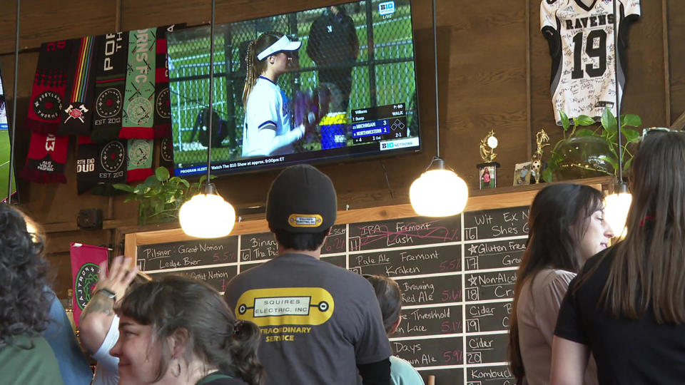 The Sports Bra, in Portland, Ore., is the first sports bar that exclusively runs women's sports on its TVs.  / Credit: CBS News