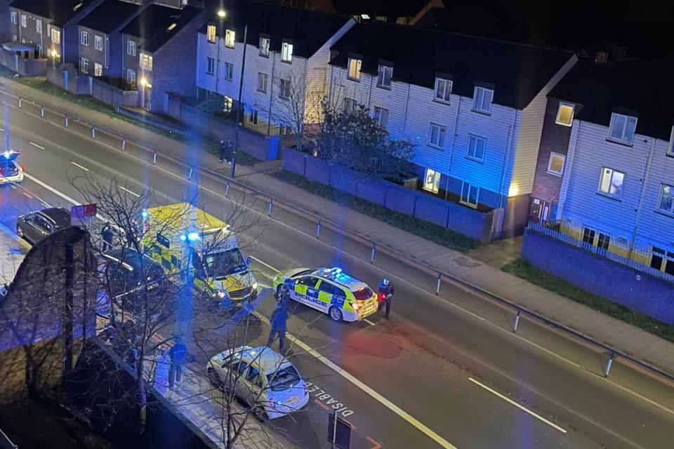 Emergency services at the scene on Battersea Park Road following the attack (PA)