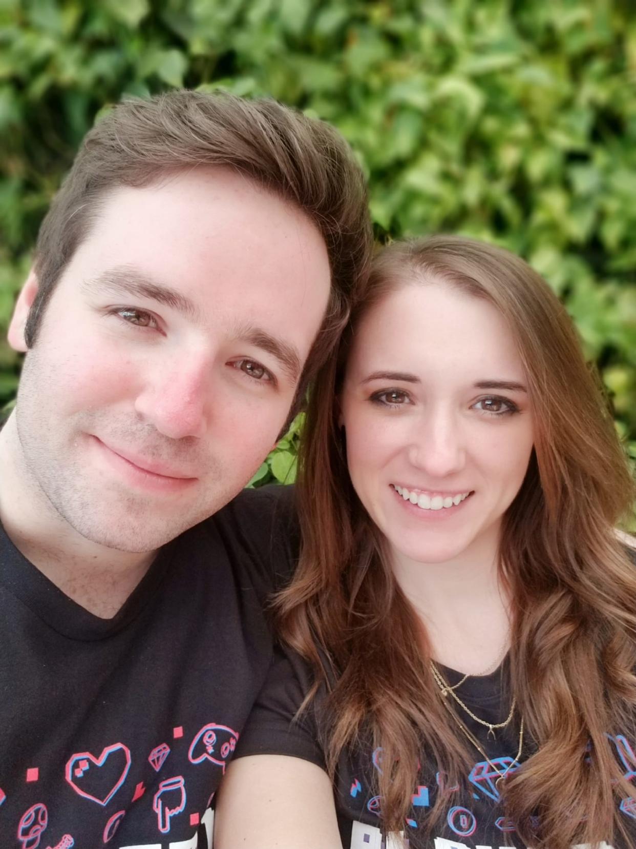 Josh Atkinson and Alexis Olson pose for a photo during a first date at Disney World in February 2019.