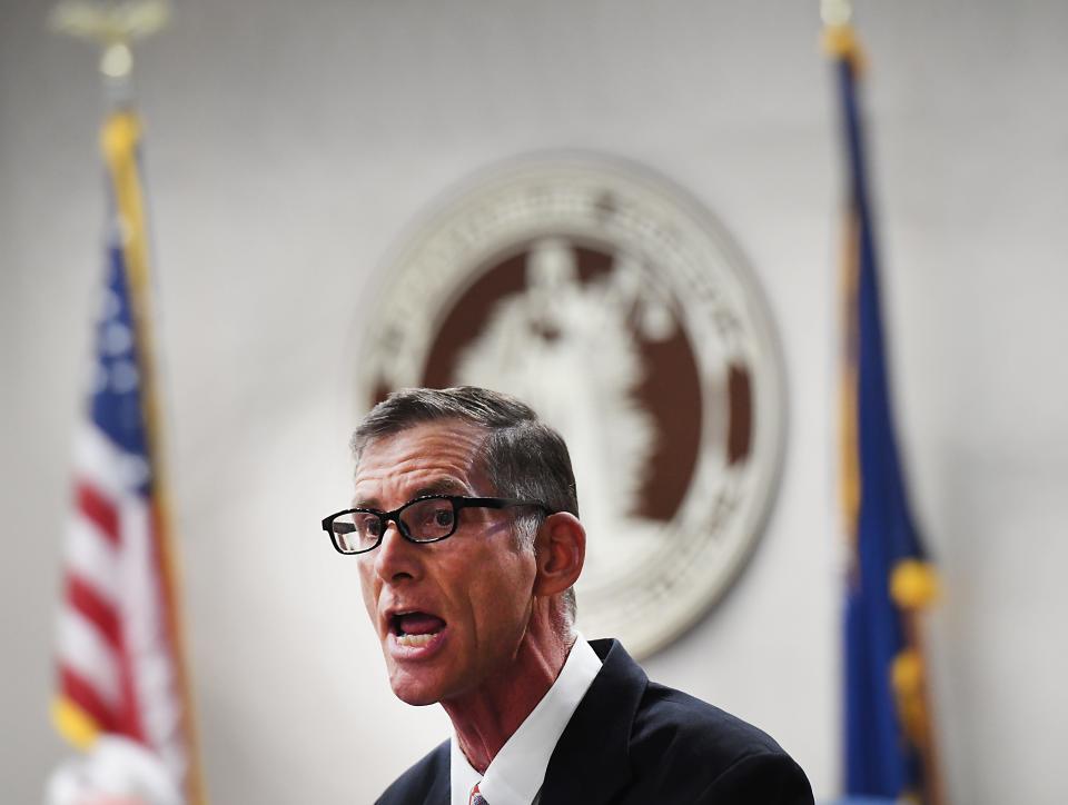 Christopher Rucker, of Boiling Springs, a member of the Sons of Confederate Veterans, makes comments about the Confederate flag on I-85 in Spartanburg County at Monday night's meeting of County Council.