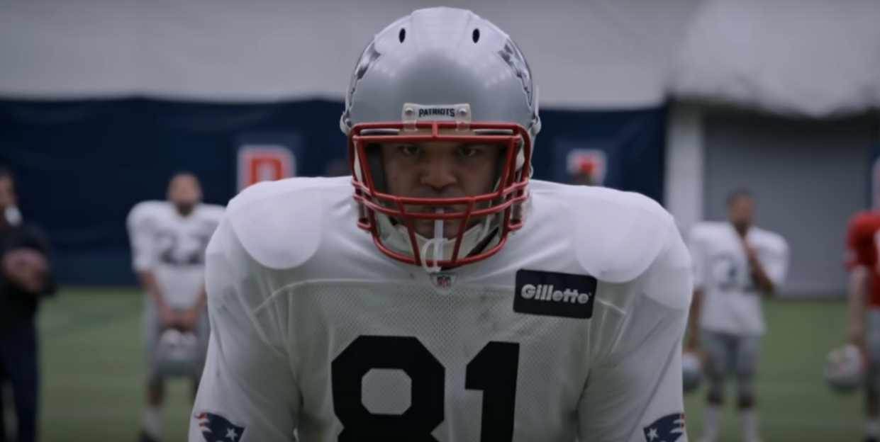 a man in football gear and helmet