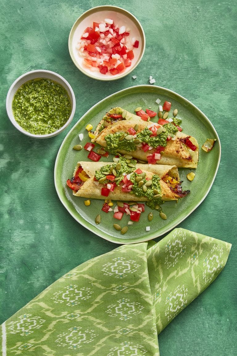 <p>Give your favorite enchiladas a fall upgrade by spooning our pumpkin seed salasa on top. </p><p><strong><em><a href="https://www.womansday.com/food-recipes/food-drinks/recipes/a60792/enchiladas-with-pumpkin-seed-salsa-recipe/" rel="nofollow noopener" target="_blank" data-ylk="slk:Get the Enchiladas with Pumpkin Seed Salsa recipe.;elm:context_link;itc:0;sec:content-canvas" class="link ">Get the Enchiladas with Pumpkin Seed Salsa recipe. </a></em></strong></p>