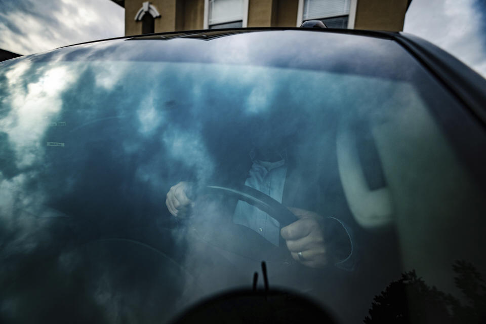 FILE - Joseph Moore sits in a pickup truck in Jacksonville, Fla., on Tuesday, Dec. 7, 2021. Moore worked for nearly 10 years as an undercover informant for the FBI, infiltrating the Ku Klux Klan in Florida, foiling at least two murder plots, according to investigators, and investigating ties between law enforcement and the white supremacist organization. Moore said he joined the Klan because the government approached him, and asked for his help. (AP Photo/Robert Bumsted, File)