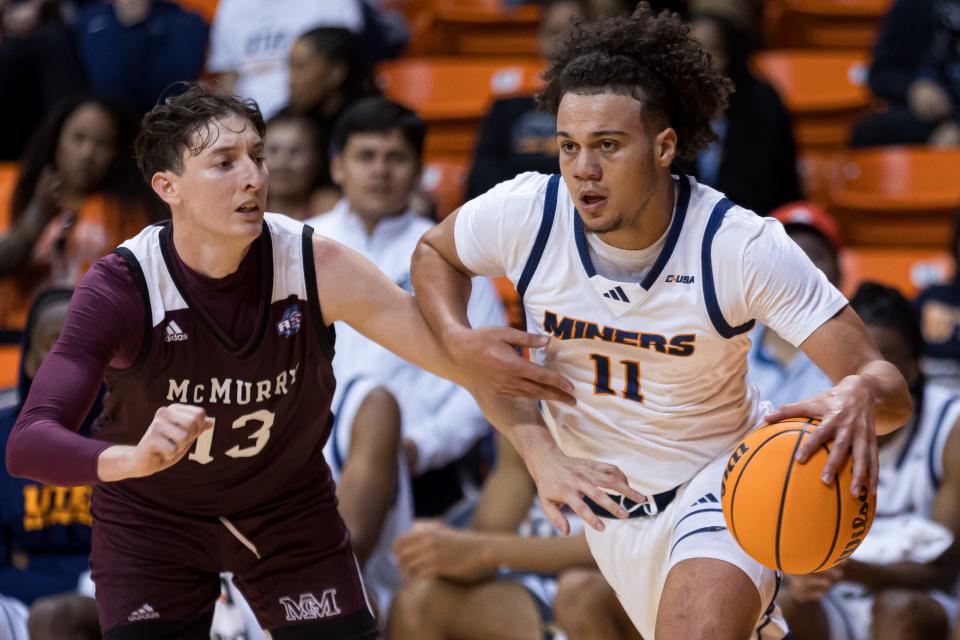 UTEP's Trey Horton III (11) and McMurry's Elias Garcia (13) at a men’s basketball game on Monday, Nov. 6, 2023 at the Don Haskins Center.