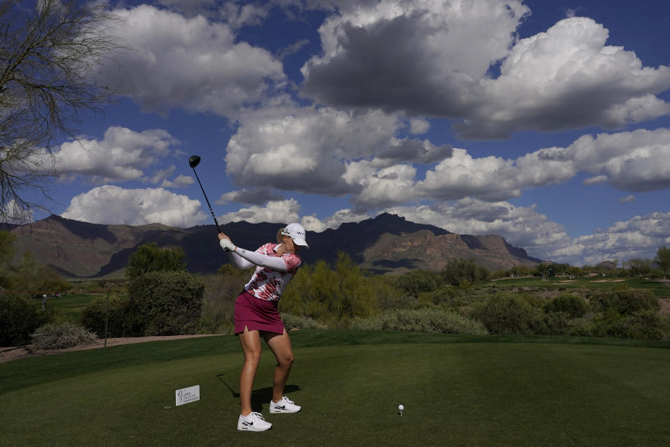 Matilda Castren, of Finland, hits from the 15th tee during the first round of the Drive On Championship golf tournament, Thursday, March 23, 2023, in Gold Canyon, Ariz. (AP Photo/Matt York)