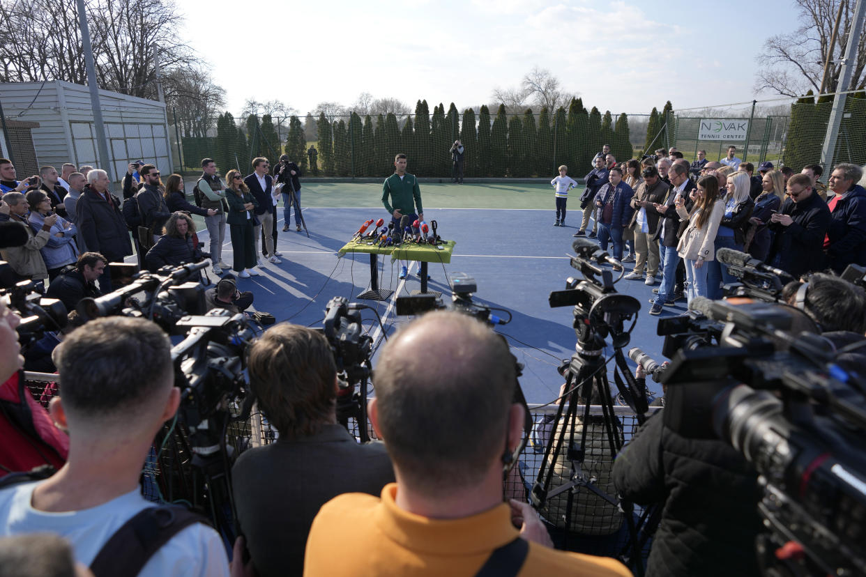 Serbian tennis player Novak Djokovic speaks during a press conference after his open practise session in Belgrade, Serbia, Wednesday, Feb. 22, 2023. Djokovic said Wednesday he still hopes US border authorities would allow him entry to take part in two ATP Masters tennis tournaments despite being unvaccinated against the coronavirus. (AP Photo/Darko Vojinovic)