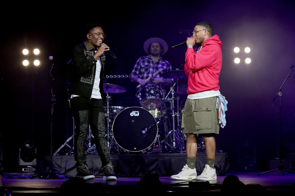 BRELAND and Nelly perform onstage for "BRELAND & Friends" concert to benefit the Oasis Center, sponsored by Amazon Music at Ryman Auditorium on April 12, 2022 in Nashville, Tennessee. (Photo by Jason Kempin/Getty Images for "BRELAND & Friends" )