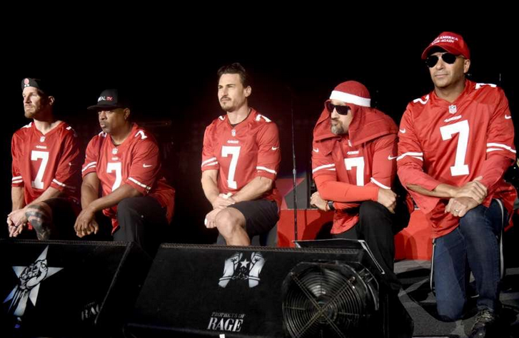 <p>“Take A Damn Knee today,” wrote the rapper, of Public Enemy fame, as he kneeled alongside his Prophets of Rage peers all wearing Colin Kaepernick jerseys. (Photo: <a rel="nofollow noopener" href="https://twitter.com/MrChuckD/status/912036621339451392" target="_blank" data-ylk="slk:Chuck D via Twitter;elm:context_link;itc:0;sec:content-canvas" class="link ">Chuck D via Twitter</a>) </p>