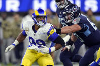 FILE - Los Angeles Rams defensive end Aaron Donald in isolated action during the first half of an NFL football game against the Tennessee Titans on Nov. 7, 2021, in Inglewood, Calif. Donald was named to The Associated Press 2021 NFL All-Pro Team, announced Friday, Jan. 14, 2022. (AP Photo/Marcio Jose Sanchez, File)