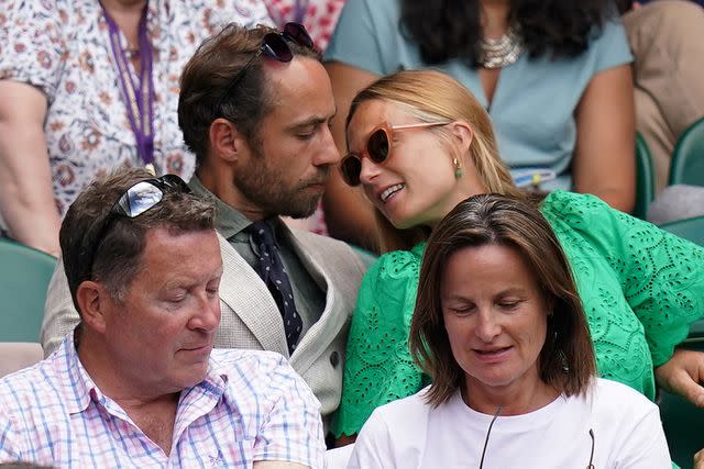 <p>Adam Davy/PA Images via Getty</p> James Middleton and his wife Alizee Thevenet at Wimbledon