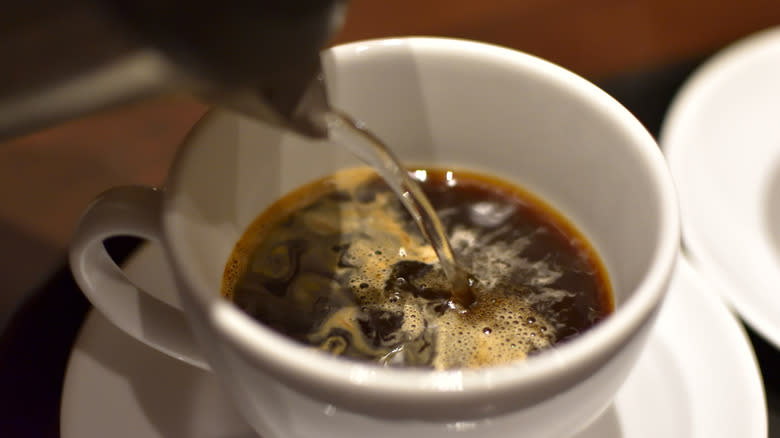 making instant coffee in cup