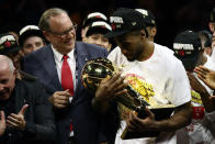 OAKLAND, CALIFORNIA - JUNE 13: Kawhi Leonard #2 of the Toronto Raptors celebrates with the Larry O'Brien Championship Trophy after his team defeated the Golden State Warriors to win Game Six of the 2019 NBA Finals at ORACLE Arena on June 13, 2019 in Oakland, California. NOTE TO USER: User expressly acknowledges and agrees that, by downloading and or using this photograph, User is consenting to the terms and conditions of the Getty Images License Agreement. (Photo by Ezra Shaw/Getty Images)