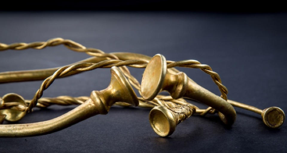 Four ancient gold torcs, jewelry that can be worn around the neck or wrist, was discovered by individuals using metal detectors in a field in Staffordshire. <cite>copyright Staffordshire City Council</cite>