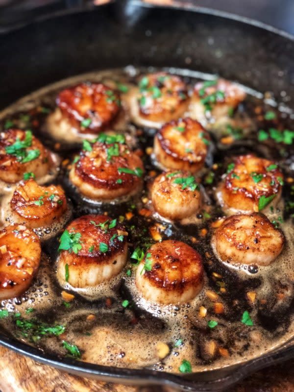 <p>Charlotte Fashion Plate</p><p>A super simple but flavorful dish, these honey garlic scallops with brown butter is going to be a favorite!</p><p><strong>Get the recipe: <a href="https://www.charlottefashionplate.com/recipes/honey-garlic-scallops-with-brown-butter/" rel="nofollow noopener" target="_blank" data-ylk="slk:Honey Garlic Scallops with Brown Butter;elm:context_link;itc:0;sec:content-canvas" class="link ">Honey Garlic Scallops with Brown Butter</a></strong></p>