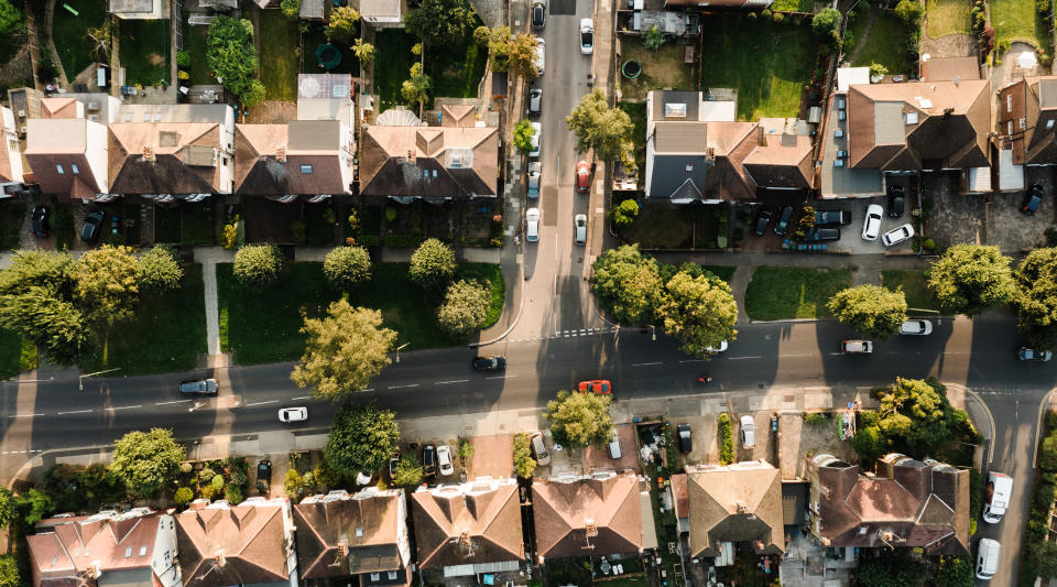 A daytime view of houses on a street in North London, UK