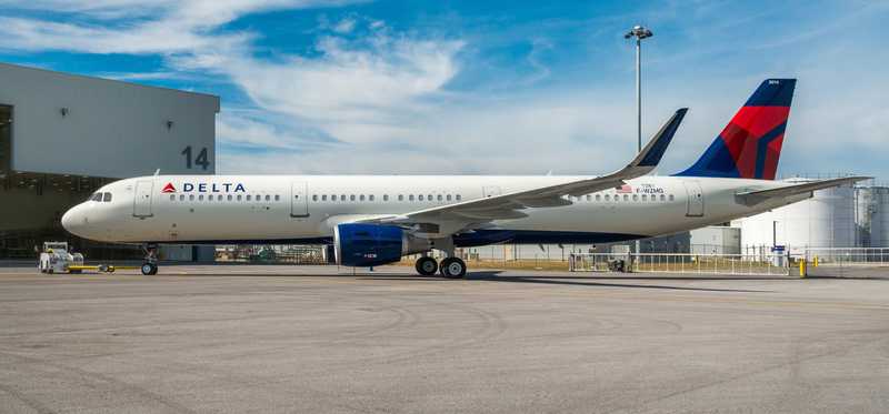 A Delta airbus on the runway.