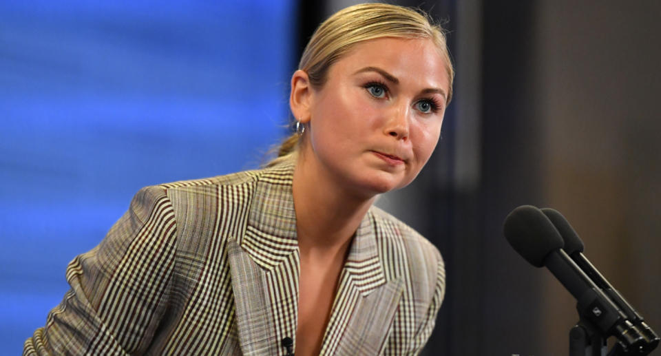 Grace Tame pictured at the Press Club microphone.