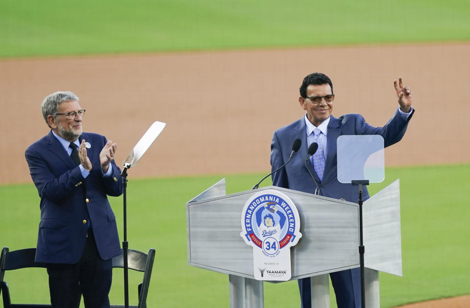 Former Los Angeles Dodgers pitcher Fernando Valenzuela greets the crowd during his jersey retirement ceremony before the baseball game between the Dodgers and the Colorado Rockies, Friday, Aug. 11, 2023, in Los Angeles. (AP Photo/Ryan Sun)