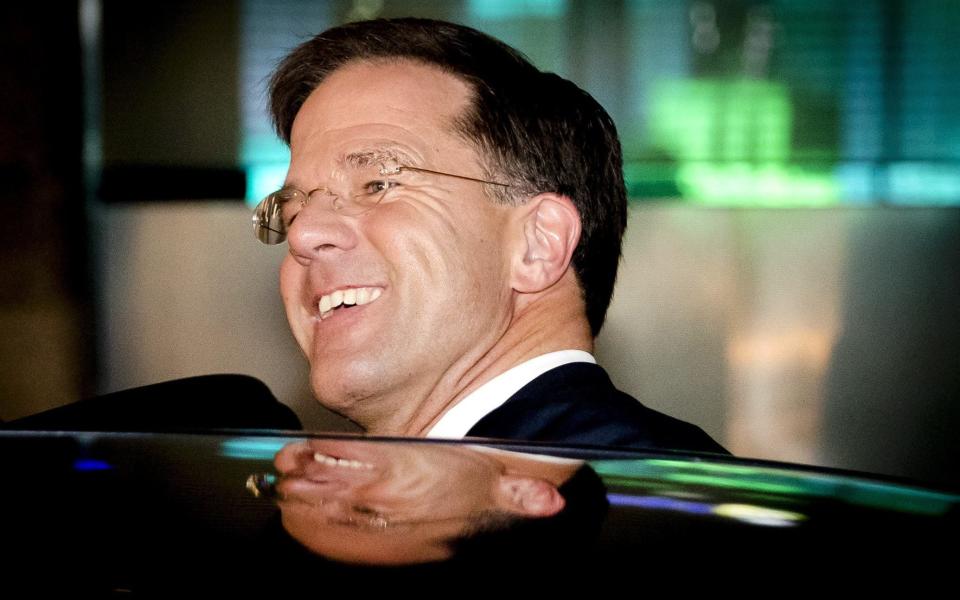 Dutch Prime Minister Mark Rutte was celebrating election victory on Wednesday night - Credit: EPA