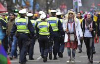 <p>Police secure the traditional Carnival parade in Duesseldorf, Germany, Monday, Feb. 26, 2017. (AP Photo/Martin Meissner) </p>