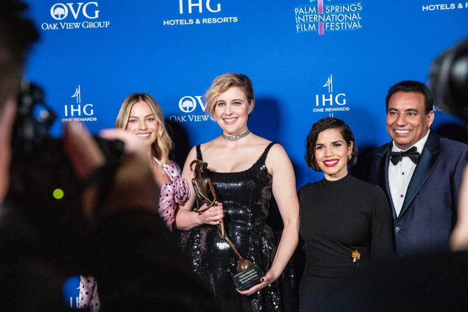 Chairman of the Palm Springs International Film Festival Chairman Nachattar Chandi, right, poses for a photograph with Margo Robbie, Greta Gerwig and America Ferrera backstage during the Film Awards in Palm Springs, Calif., on Thurs., Jan. 4, 2024.
