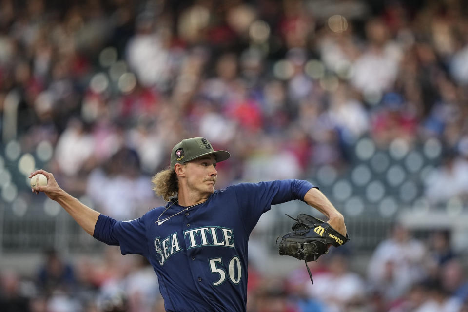 Seattle Mariners starting pitcher Bryce Miller (50) delivers in the first inning of a baseball game against the Atlanta Braves, Friday, May 19, 2023, in Atlanta. (AP Photo/Brynn Anderson)