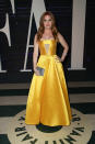 <p>Isla Fisher channels Belle from <i>Beauty and the Beast.</i> (Photo: Getty Images) </p>