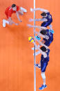 <p>TOKYO, JAPAN - JULY 26: Team Italy blocks the hit by Team Poland during the Men's Preliminary Round - Pool A volleyball on day three of the Tokyo 2020 Olympic Games at Ariake Arena on July 26, 2021 in Tokyo, Japan. (Photo by Toru Hanai/Getty Images)</p> 